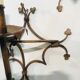 Paire d'appliques en métal doré à décor de trèfles