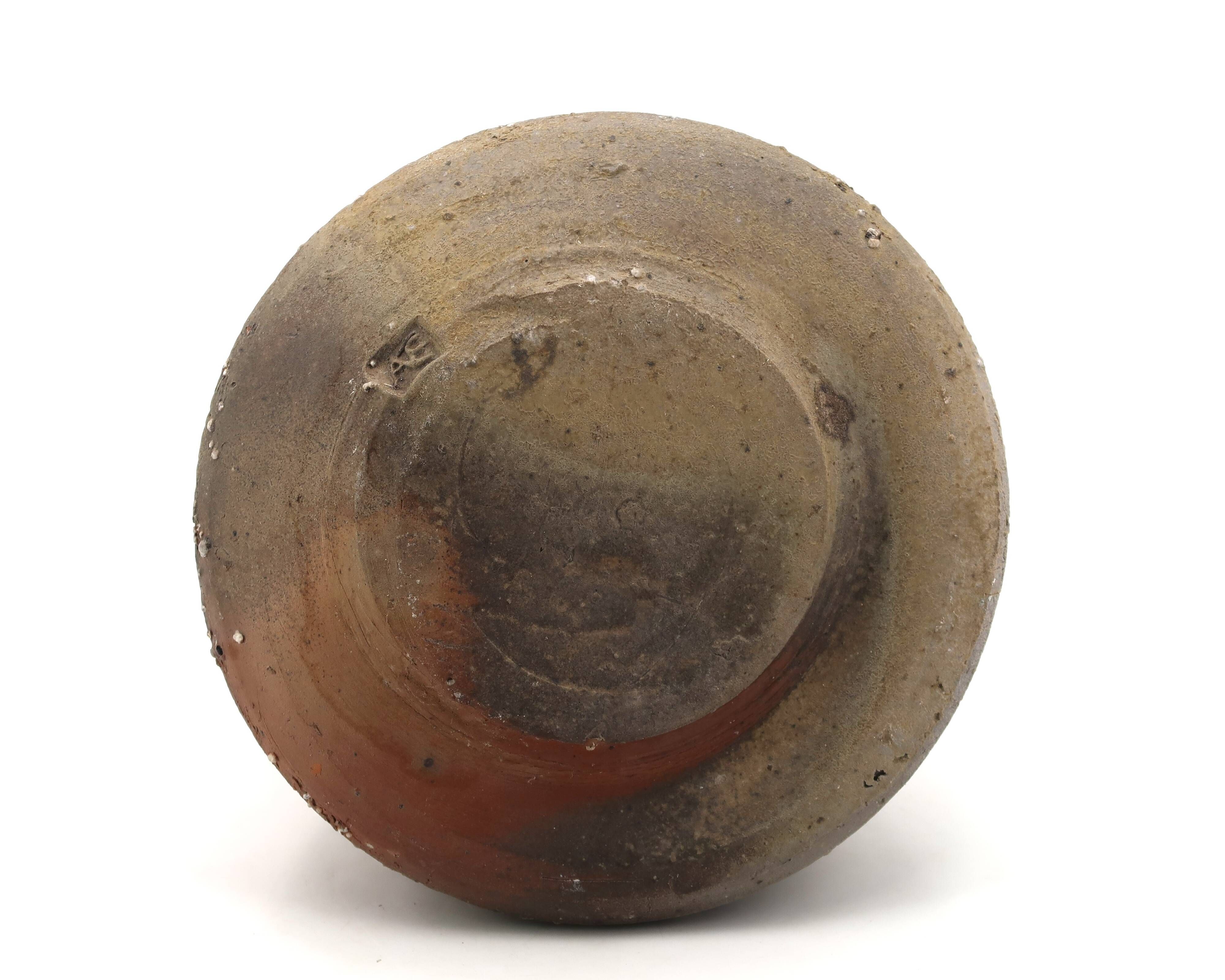 Sandstone sculpture by Eric Astoul, ceramic wood-fired kiln.