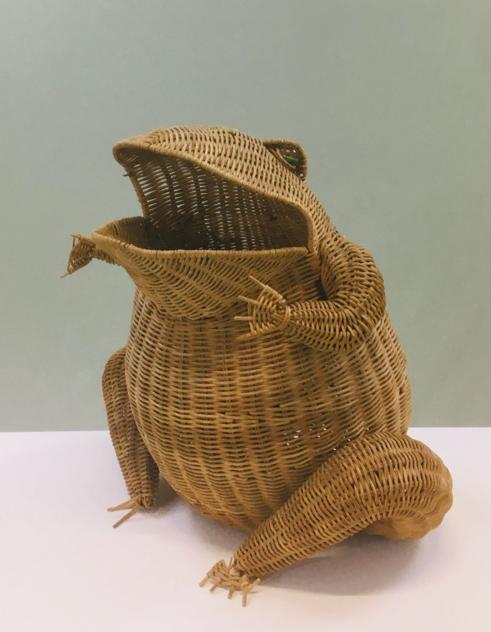 Olivier Cajan's frog magazine rack in 1975, wicker and rattan