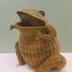 Olivier Cajan's frog magazine rack in 1975, wicker and rattan
