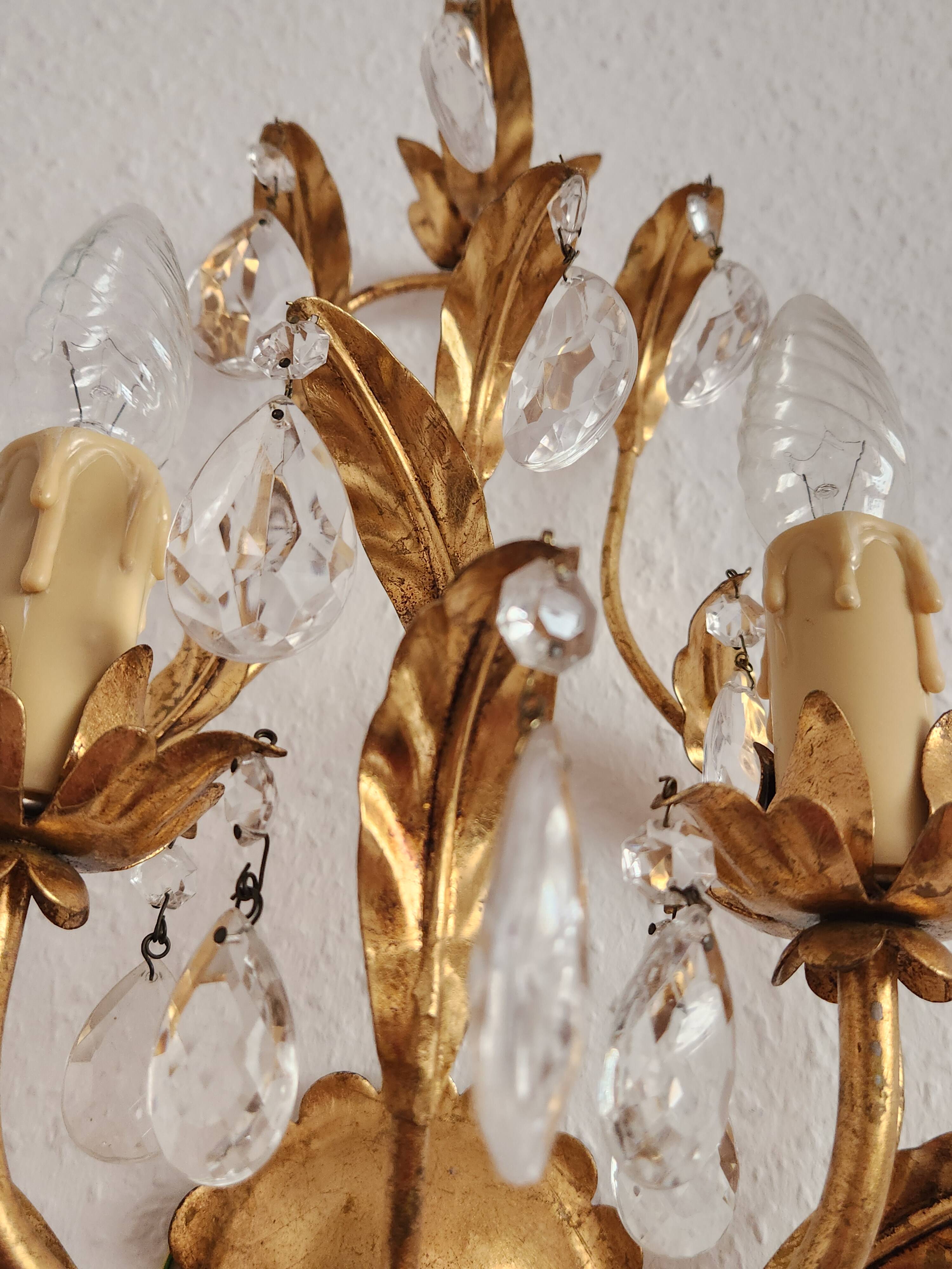 Hand-forged wall lamp gilded with gold leaf and crystals, Italy
