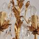 Hand-forged wall lamp gilded with gold leaf and crystals, Italy