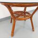Table basse ronde vintage en verre fumé et rotin des années 70