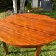 Extendable round table by Luigi Bartolini