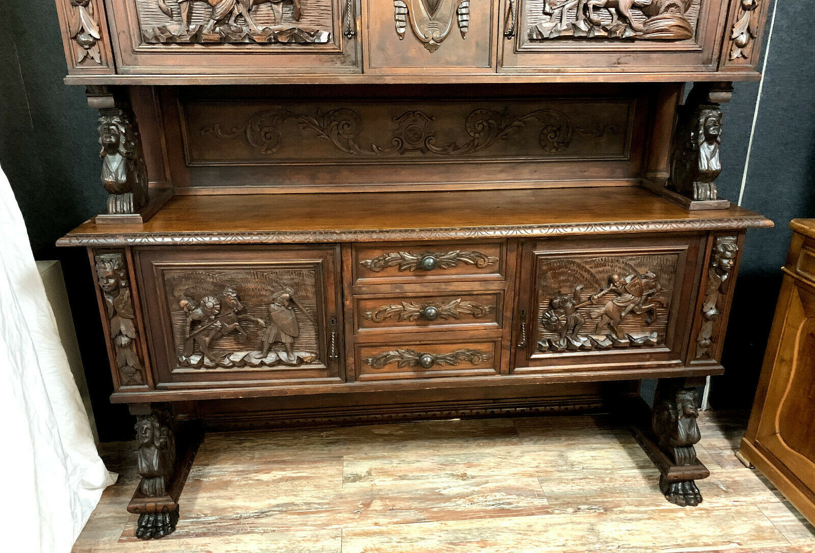 Wooden Renaissance hunting pavilion buffet made entirely carved with war attributes