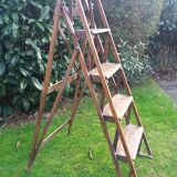 Old renovated folding painter stepladder