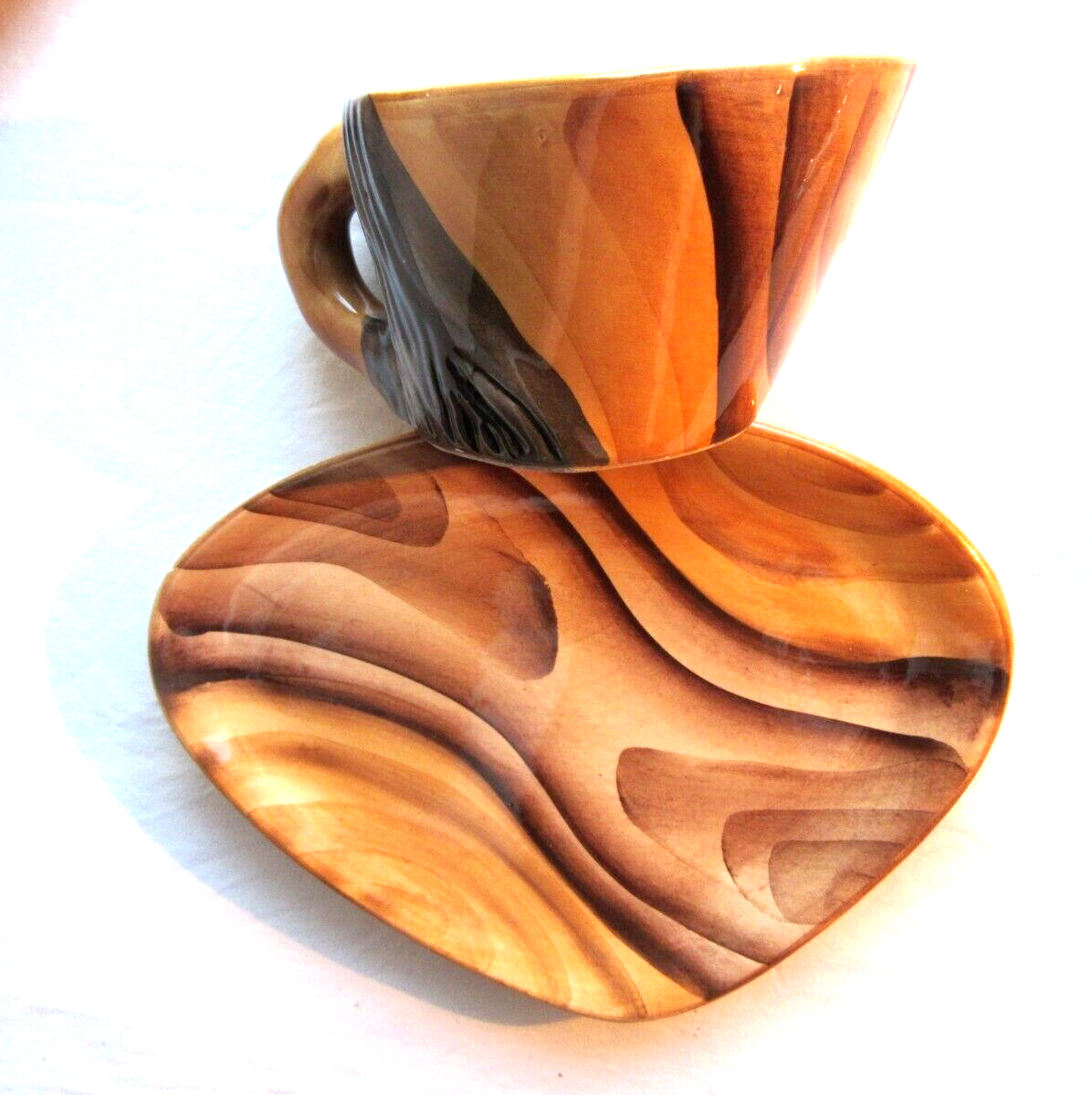 2 lunches decorated in faux wood style, cups + saucers, signed VALLAURIS