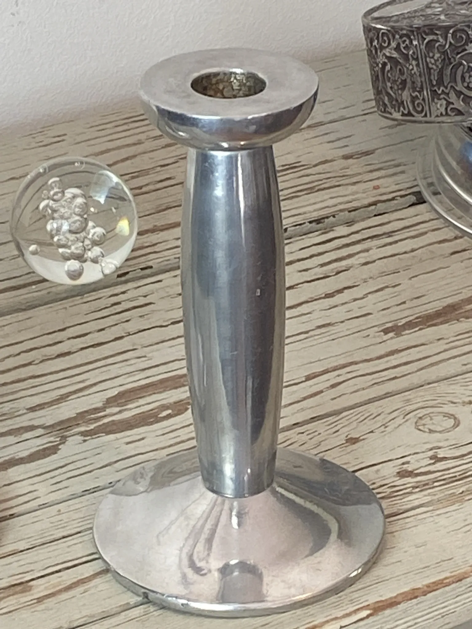 Pair of minimalist polished aluminium candle holders