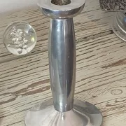 Pair of minimalist polished aluminium candle holders