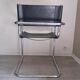 Fauteuil en inox et cuir