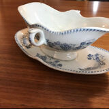 Lunéville sauceboat in iron earth from the early 20th century