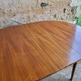 Scandinavian round extendable table in teak 1960's