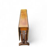 “Gateleg” folding walnut table