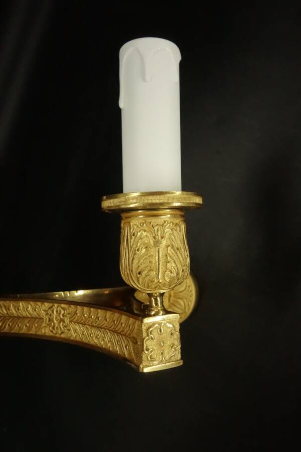 Pair of wall sconces in Restoration style, early 19th century - gilded bronze signed MENE.