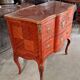 Curved jump commode in Louis XV style with marquetry and gilded bronzes.