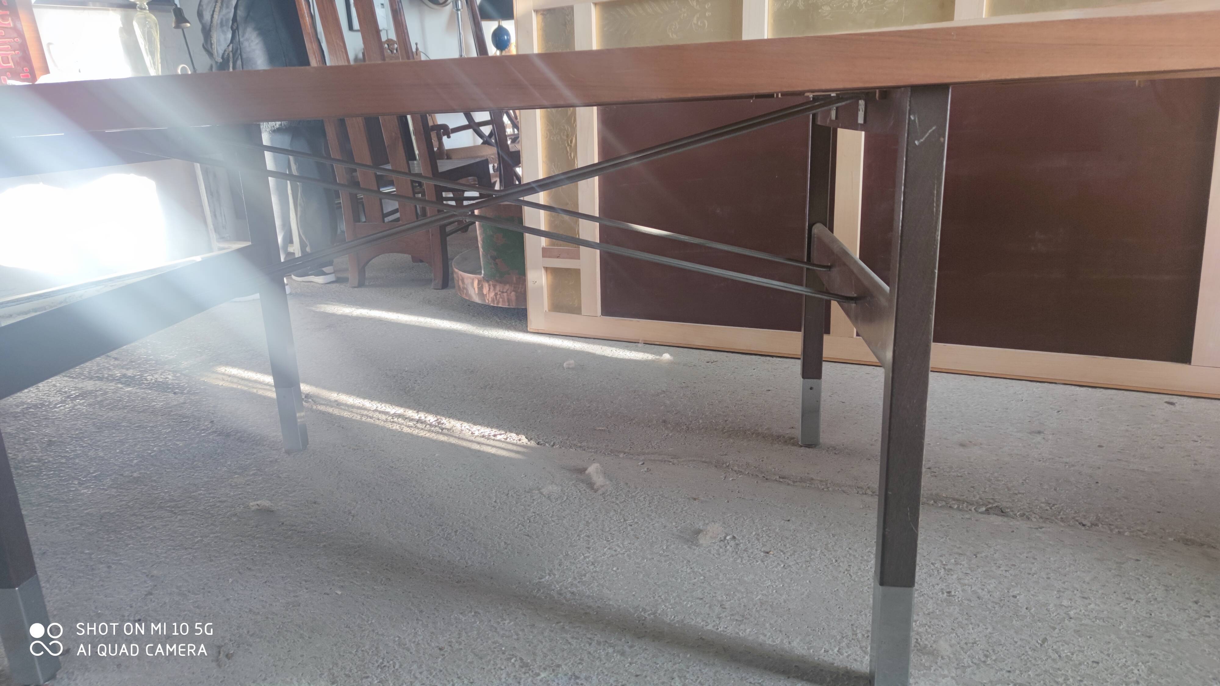 Extendable dining table in walnut, mahogany and chrome, circa 1960