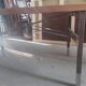 Extendable dining table in walnut, mahogany and chrome, circa 1960
