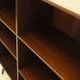 Danish mahogany veneered shelving unit on splayed legs, 1960s