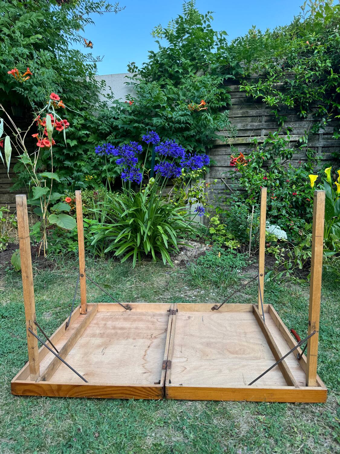 Old suitcase, table and stools, vintage wooden picnic