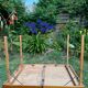 Old suitcase, table and stools, vintage wooden picnic