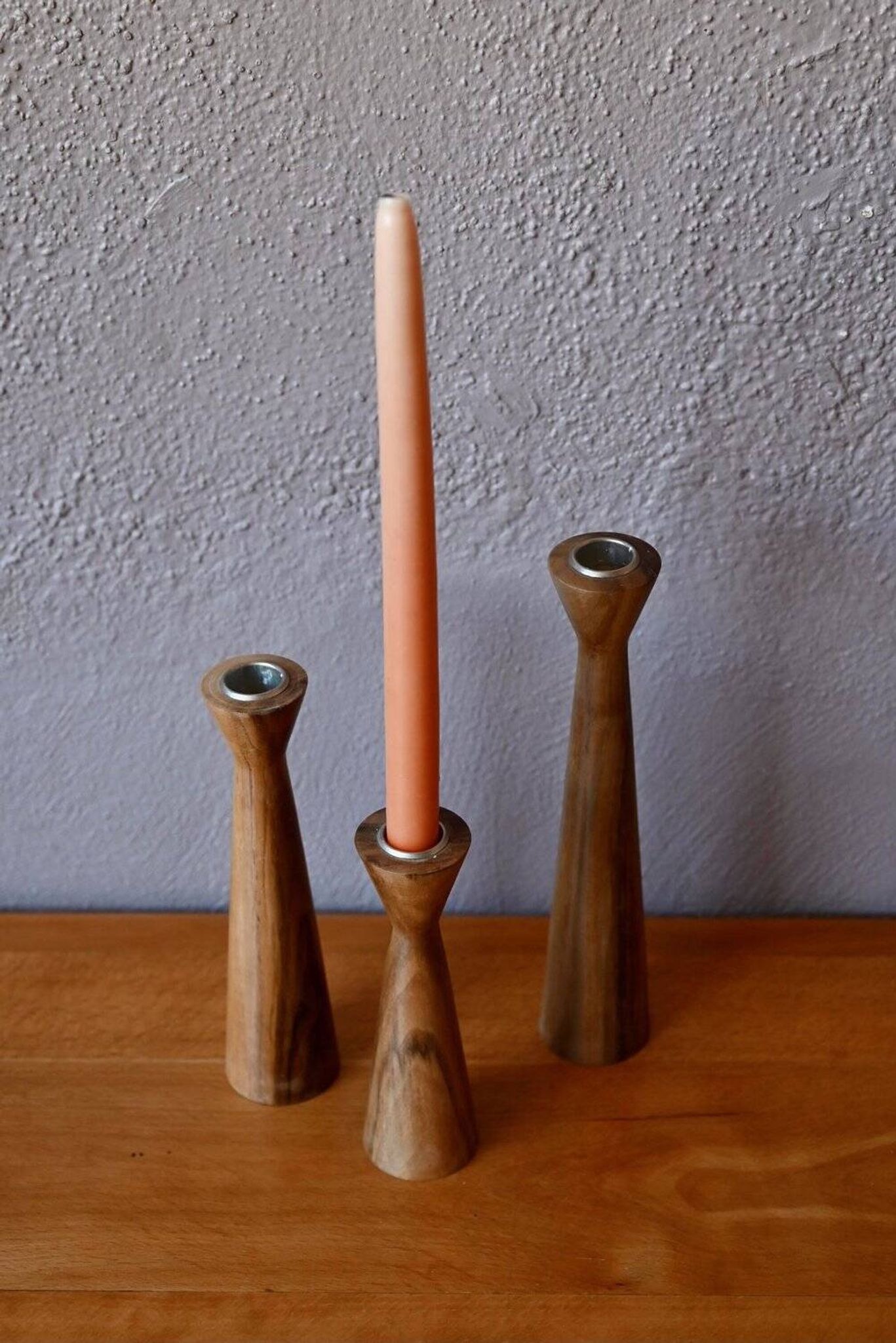Set of three turned wooden candlesticks, Danish Scandinavian design, 1960s.