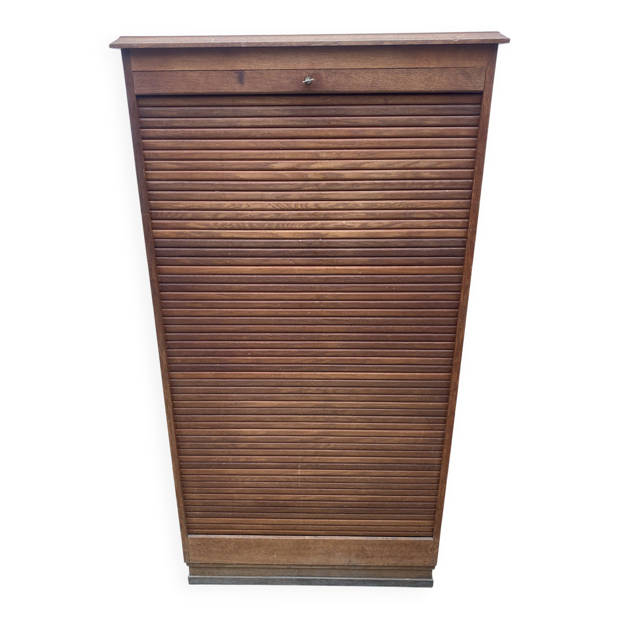 Oak two-column filing cabinet with curtains.