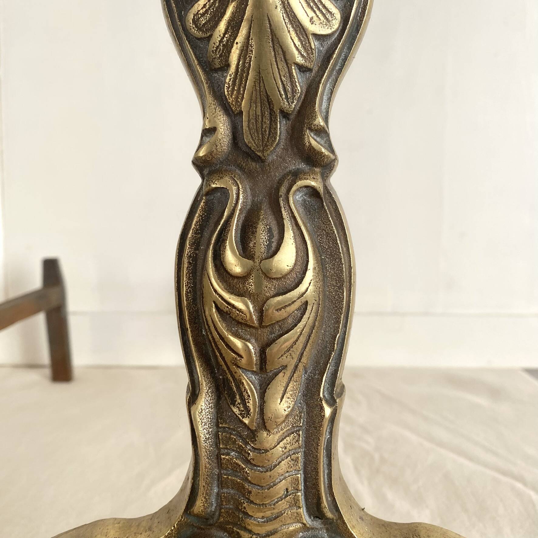 Pair of brass and cast iron fire dogs