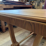 Art Deco table with extensions.