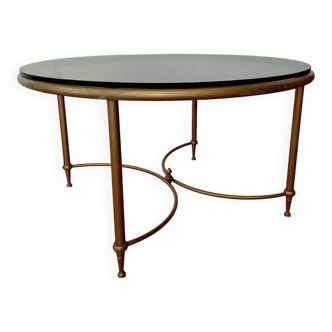 Round coffee table with smoked glass and metal from the 70s.