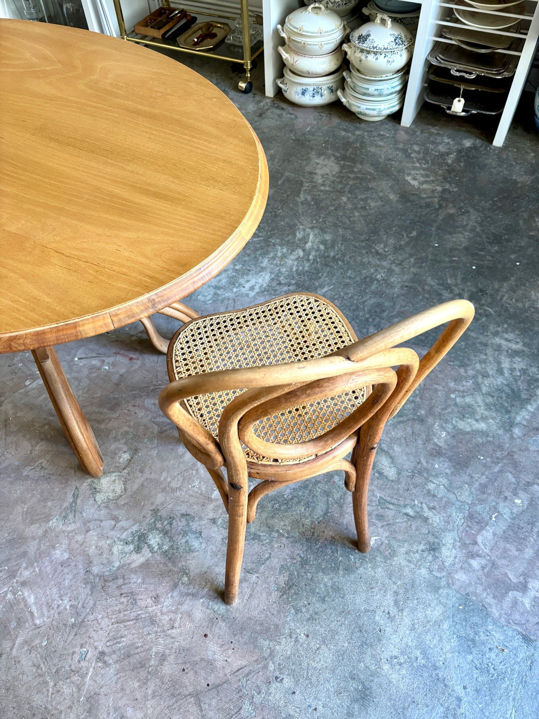 Thonet table no. 3 and 4 bent beech chairs with caning, circa 1890.