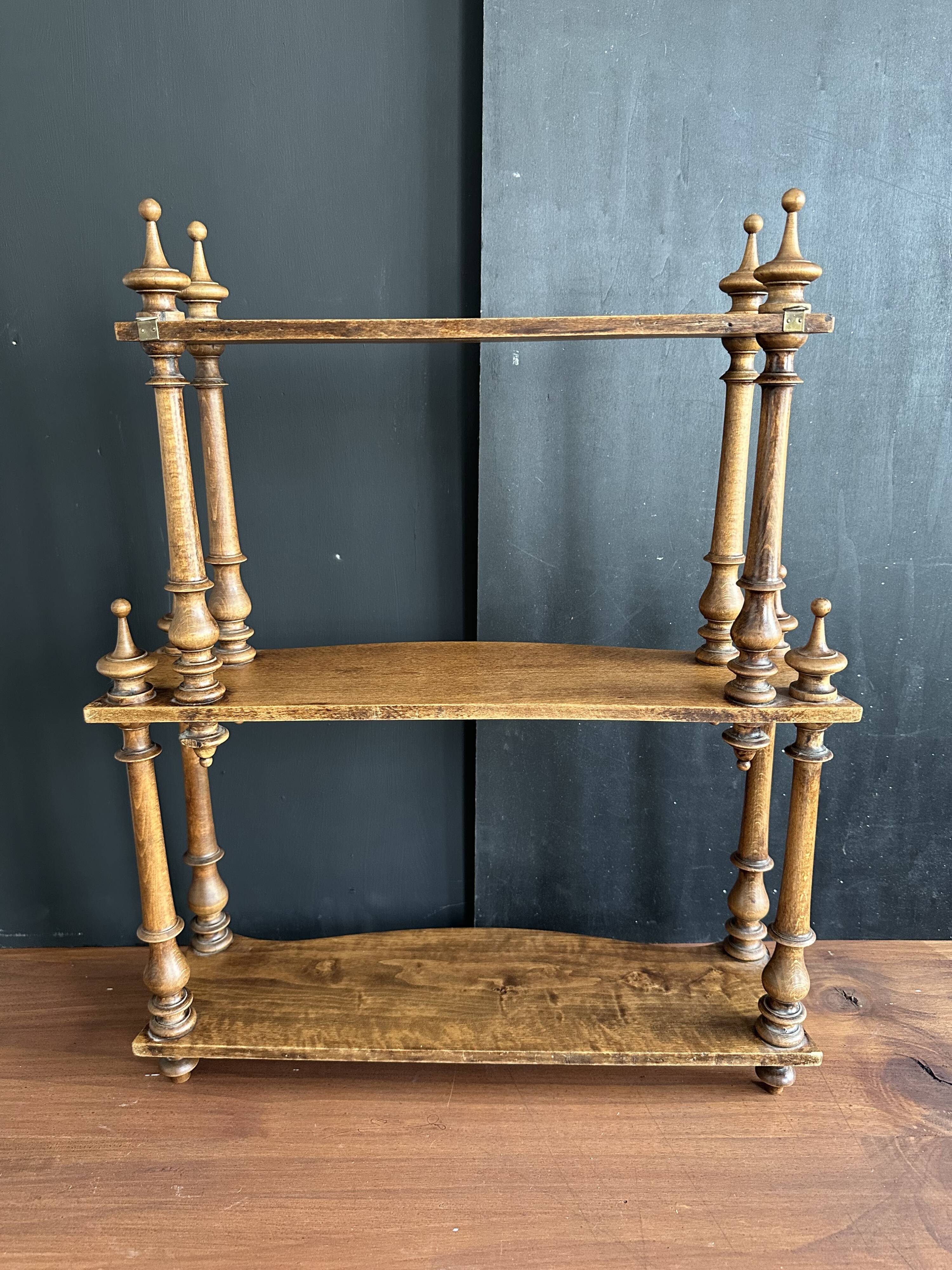 Antique turned wooden shelf with three levels, around 1900.