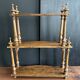 Antique turned wooden shelf with three levels, around 1900.