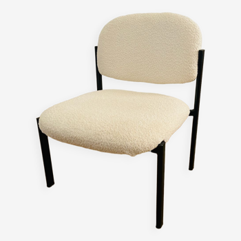 White and metal loop design armchair