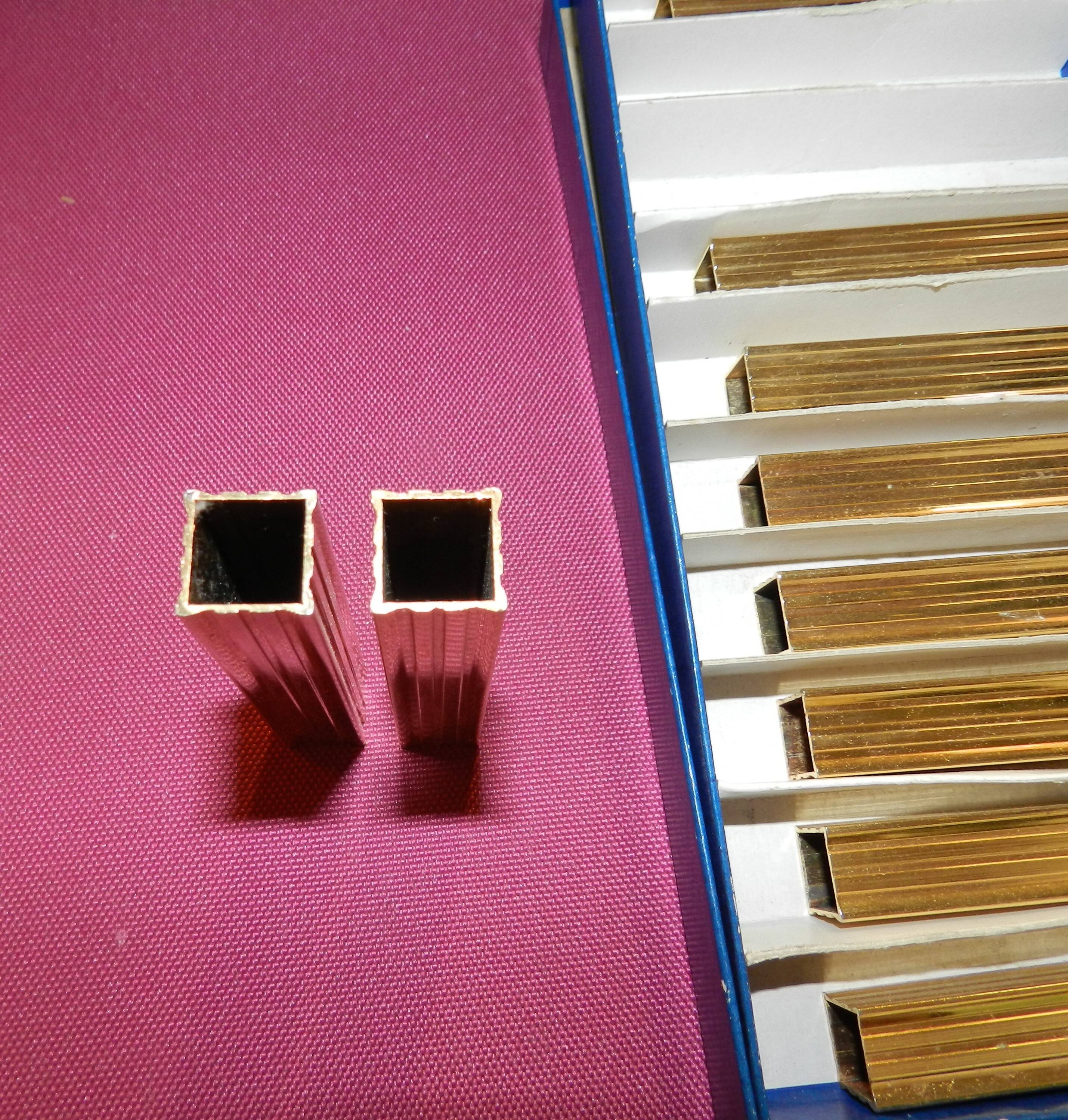 Lot de 12 porte-couteaux dorés