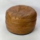 Round leather pouf De Sede from the 1970s.