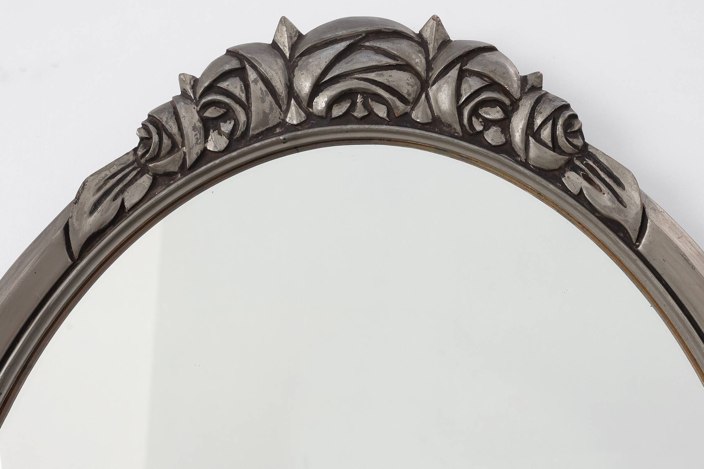 French Art Deco Oval Mirror with Carved Roses and Silver-Painted Frame