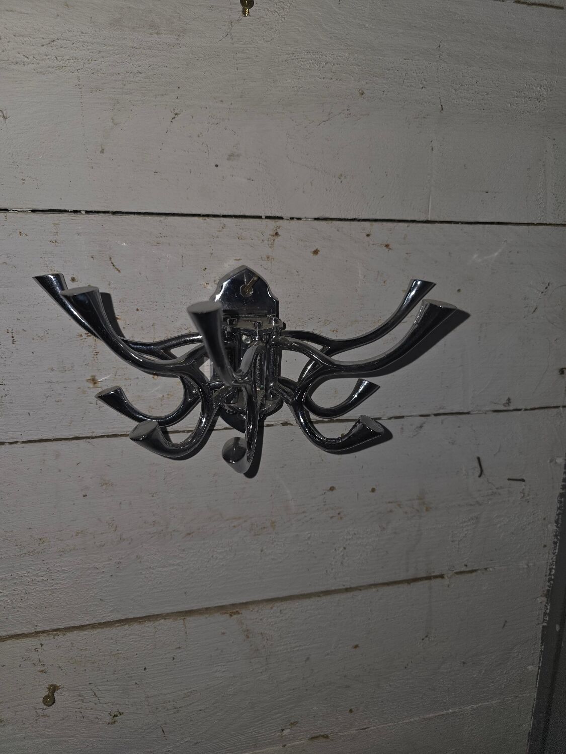 Circular coat rack in chrome-plated iron