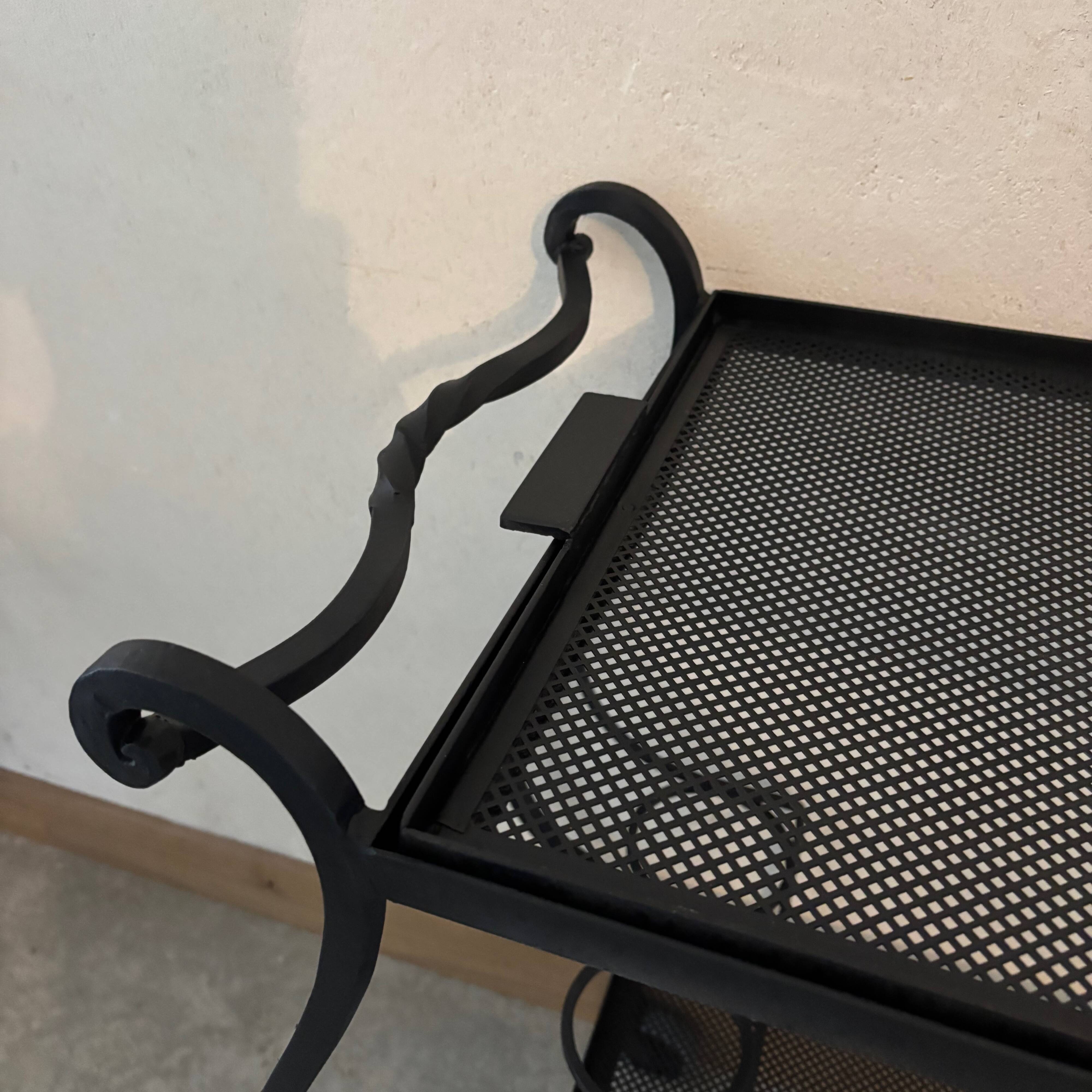 Black dessert in perforated sheet metal