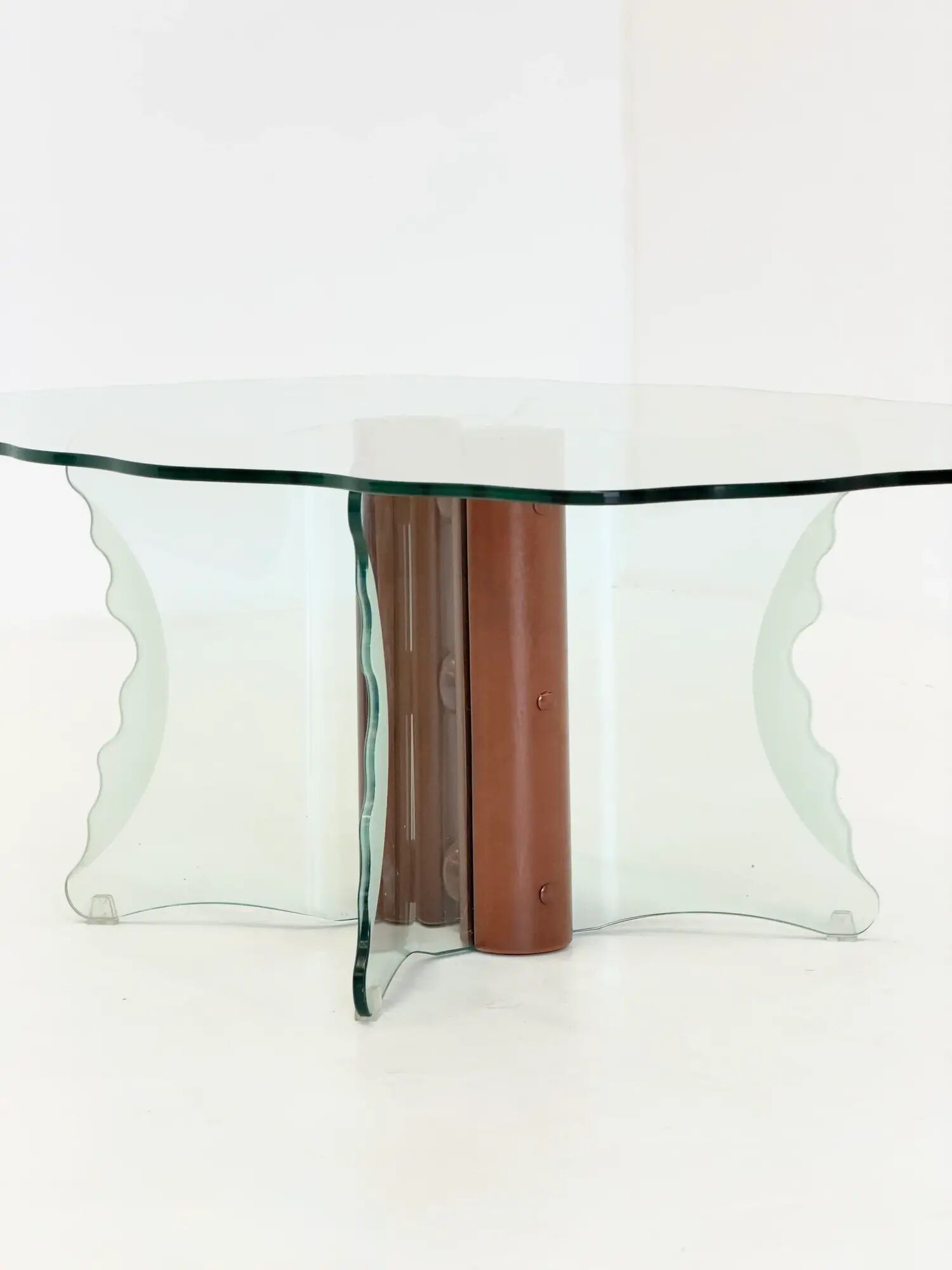 Vintage postmodern coffee table with wavy glass and wooden spheres
