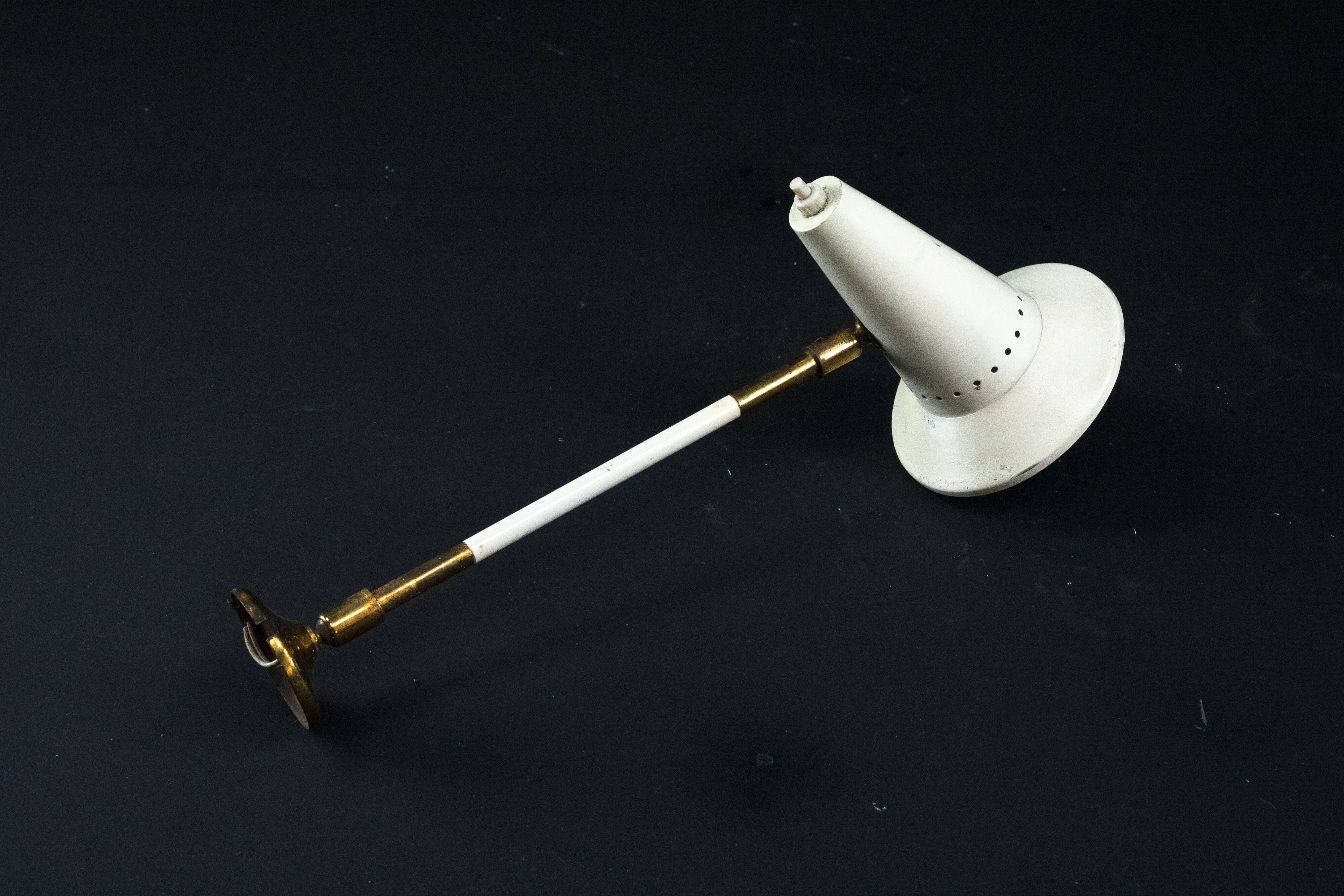 Mid-Century orientable wall lamp by Stilux Milano, Italy, 1950s.