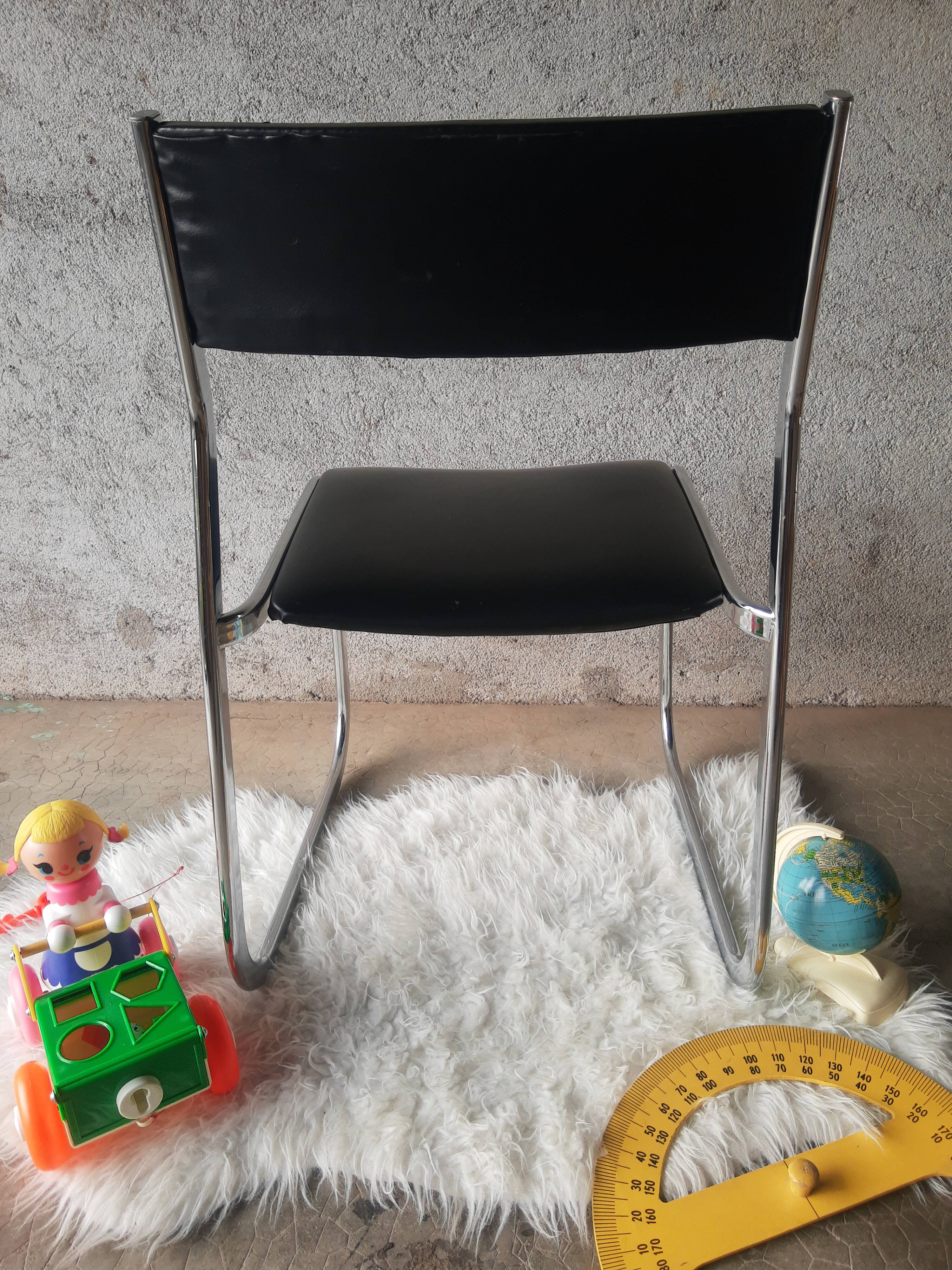 Vintage 70s black skai sled chair