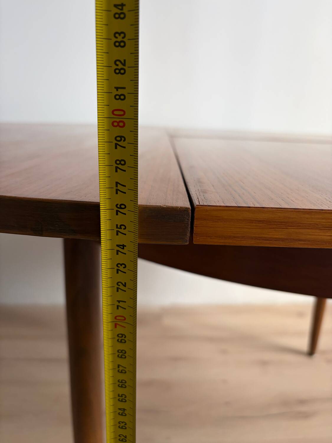 Vintage Scandinavian round table from the 50s and 60s in extendable teak with ra.