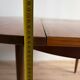 Vintage Scandinavian round table from the 50s and 60s in extendable teak with ra.
