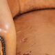 Set of two vintage sheepskin club armchairs with a beautiful light colour