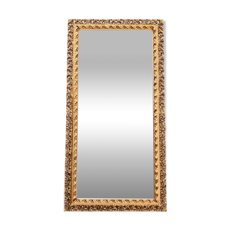 A unique mirror in an openwork frame