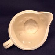 Antique milk jug in Gien earthenware, Valence model A040.