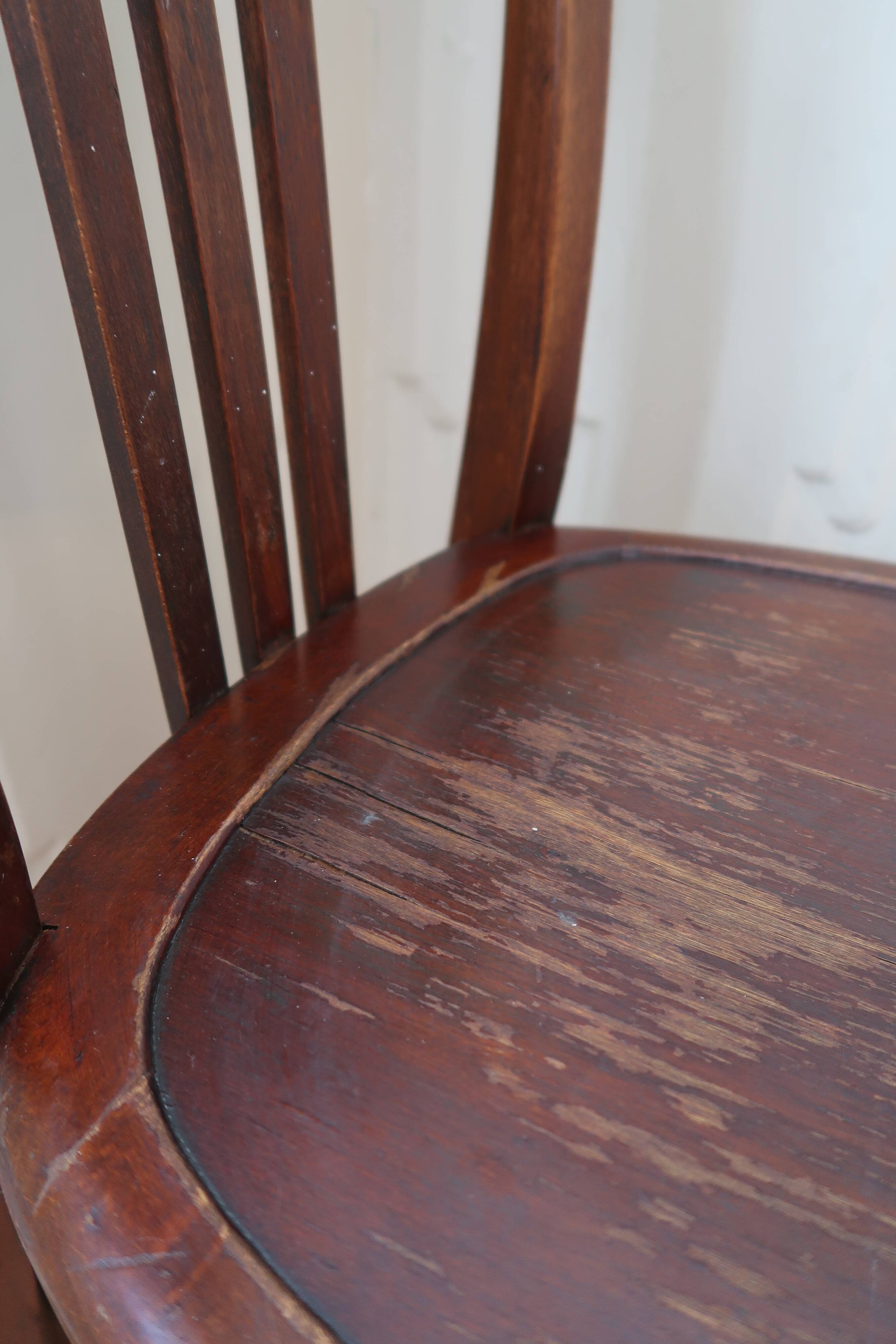 Pair of patinated bistro chairs