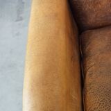 Charming 2-seater designer sofa made of sheep leather with a rustic look