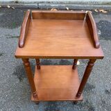 Solid wood shelf with carved legs