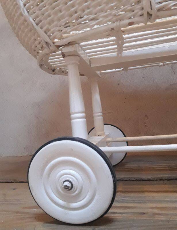 Wicker and painted wood baby cradle